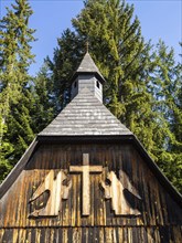 Church tower, carving, kneeling angels, Schacherbauer Chapel, near St. Jakob im Walde, Styria,