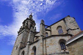 The church Iglesia de San Anton at the river Nervion in Bilbao, Gothic bell tower of a church under