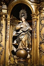 The Iglesia de San Anton church on the Nervion river in Bilbao, A magnificent statue of the Madonna