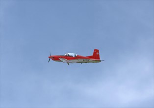 Two-seater Pilatus PC-7 turboprop training aircraft of the Swiss Air Force in flight, Payerne