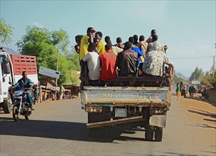 South Ethiopia, passenger transport, shared taxi, van on the road between Konso and Awassa, street