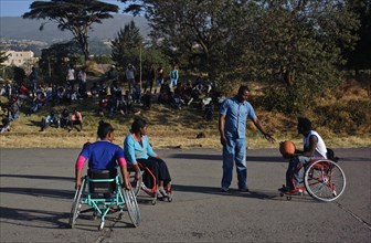 Handicapped people playing basket ball, listening the referee, Ethiopia, Africa