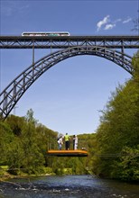 Muengsten Bridge with diesel railcar and transporter bridge over the Wupper, Solingen, Bergisches