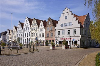 Historic houses with gables on the market square in Friedrichstadt, Nordfriesland district,