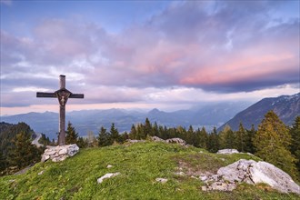 Ahornbuechsenkopf with summit cross at sunset, clouds and blue sky, Rossfeld Panoramastrasse,