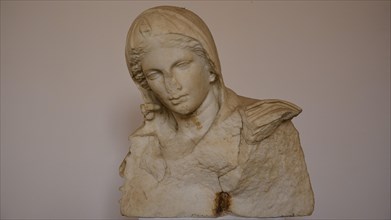 Bust of a woman, A marble bust depicting a person with a melancholic expression, Interiors,