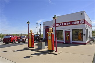 Cars on the Route 66, historic petrol station with old cars, Galena, Kansas