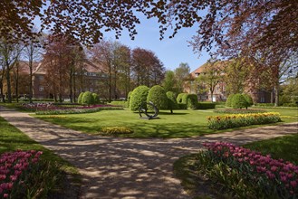 Park on Marktstrasse in Niebuell, North Friesland district, Schleswig-Holstein, Germany, Europe