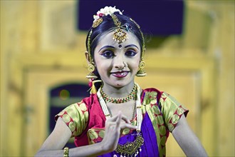 Indian dancer, 10 years old, dancing Indian classical dance, close-up, Thekkady, Kerala, India,