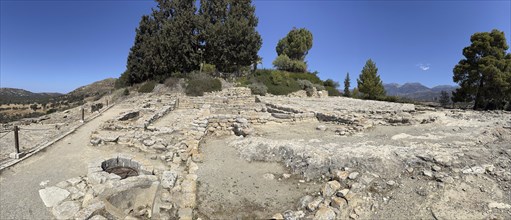 Panoramic view of part of excavation site on hill of Phaistos with foundations of Roman building