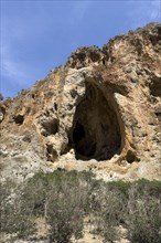 View of large natural cave A Muerte Cave in Agiofarago Gorge of the Saints on south coast of Crete