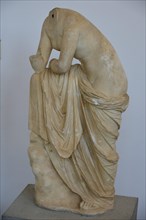 Statue, Torso, Aphrodite, Headless marble sculpture of a seated figure, wrapped in a cloth,