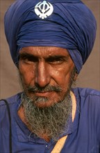 Portrait of a sikh man, man from the Nihang order, the sikh warrior order, India, Asia
