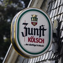 Advertising sign for Zunft Koelsch at the railway station building in Solingen-Schaberg, Solingen,
