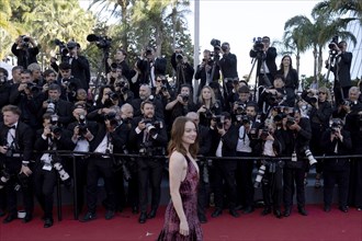 Cannes, France, 17.5.2024: Emma Stone and photographers at the premiere of Kinds of Kindness on the