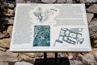 Tourist sign for upper square open space in front of palace of Phaistos, from Minoan culture of