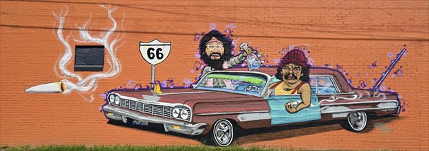 Mural on Route 66 of two stoners in a car, USA, North America