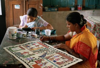 Two women painting mithila art, working in a handicraft centre, Janakpur, Nepal, Asia