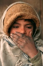 Shy boy working as a tea shop servant, Northern Pakistan