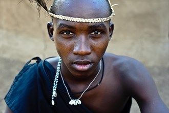 Portrait of a teenage boy following his initiation rite, teen from the Njemps tribe, Kenya. Once