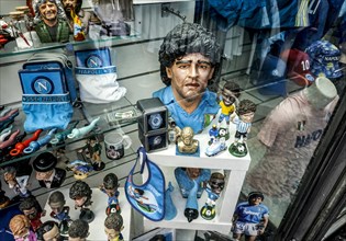 Diego Maradonna figurine in a souvenir shop. Maradonna brought success to SSC Napoli in the 1980s,