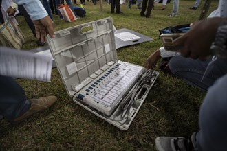 Barpeta, India. 6 May 2024. Polling officials check Electronic Voting Machines (EVMs) before