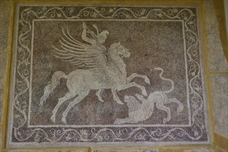 Ancient mosaic with Bellerophon on horse Pegasus fighting a chimera, surrounded by decorative