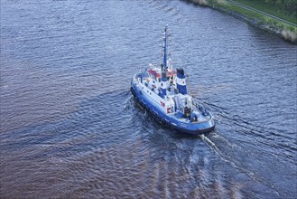 Bird's eye view of the Fairplay-54 tugboat on the Kiel Canal near Beldorf, Rendsburg-Eckernfoerde