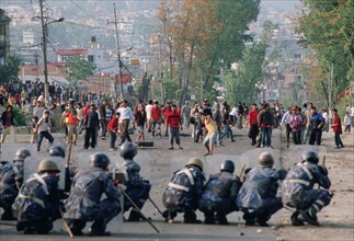Rioters fighting against policemen for more democracy, Kathmandu, Nepal, Asia