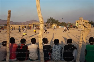 Teenage boys are playing football, public watching a football match, Afar state, Ethiopia, Africa
