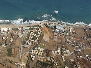 Aerial view of beach sea beach section with hotel complexes near Heraklion, Heraklion, Crete,