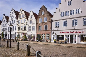 Historic gabled houses on the market square in Friedrichstadt, Nordfriesland district,