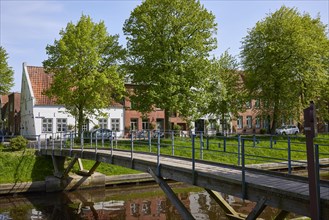 Kohbruech bridge over the Mittelburggraben and the Schiefe Haus in Friedrichstadt, district of