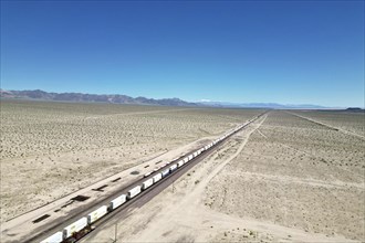 Drone shot of Route 66 with railway, Mojave Desert, California