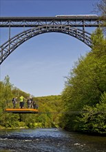 Muengsten Bridge with diesel railcar and transporter bridge over the Wupper, Solingen, Bergisches