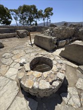 Historical shaft in ground from antiquity In archaeological site of Minoan culture of pre-Greek