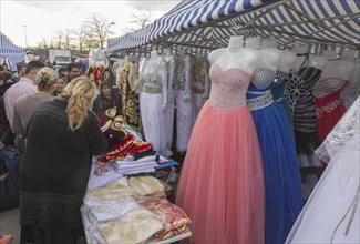A Turkish stall offers women's clothing at the flea market in Gelsenkirchen, on 12/04/2015,