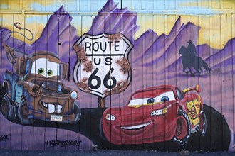 Mural with Lightning McQueen and Mater, two characters from the animated film Cars on Route 66,