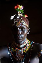 Portrait of a young man from the Njemps tribe Kenya, After completing his initiation rite, he is