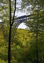 View from the forest to the Muengsten Bridge with railway, the highest railway bridge in Germany