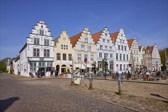 Historic houses with gables on the market square in Friedrichstadt, Nordfriesland district,