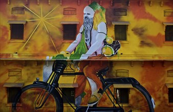 Mural painting depicting a hindu ascetic riding a cycle, Allahabad, India, Asia