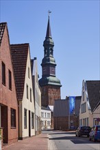 Houses and St Laurentius Church in Toenning, North Friesland district, Schleswig-Holstein, Germany,