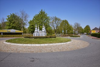 Roundabout with the Toenning Castle as decoration in Toenning, North Friesland district,