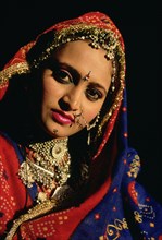 Traditionally dressed woman, adorned with silver jewellery, Jodhpur, india