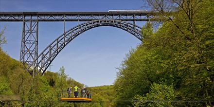 Muengsten Bridge with diesel railcar and transporter bridge over the Wupper, Solingen, Bergisches