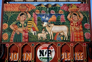 Painting at the rear of a truck, idealized rural scene, Rajasthan, India, Asia
