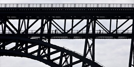 Muengsten Bridge with railway workers, highest railway bridge in Germany between Solingen and