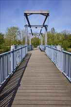 Blue bridge over the Westersielzug in Friedrichstadt, district of Nordfriesland,