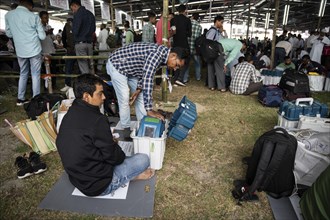 Barpeta, India. 6 May 2024. Polling officials collects Electronic Voting Machines (EVMs) and Voter